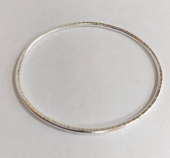 Sterling silver hammered oval bangle