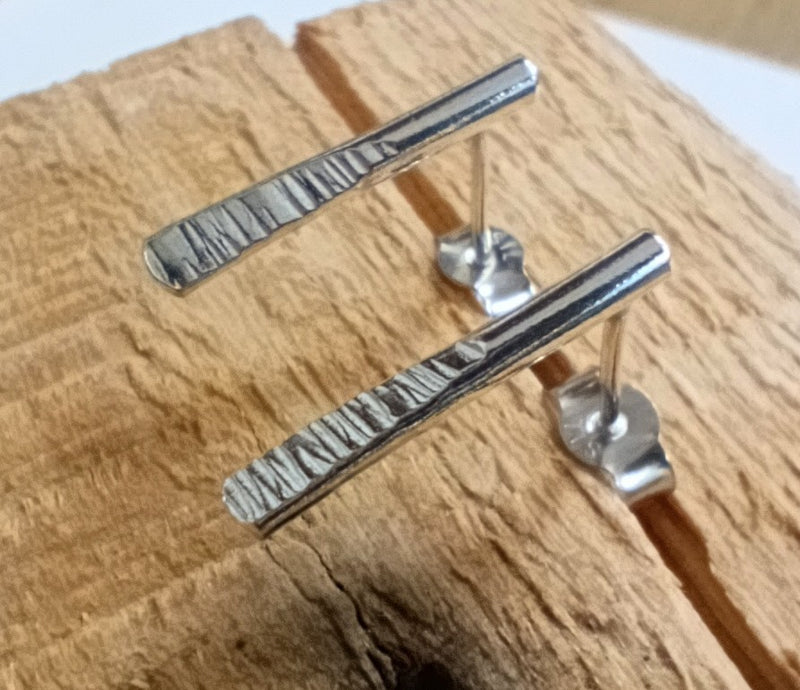 Sterling silver textured 'paddle' studs