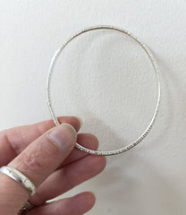 Sterling silver hammered oval bangle