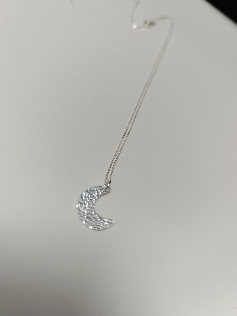 Sterling silver mini crescent moon pendant