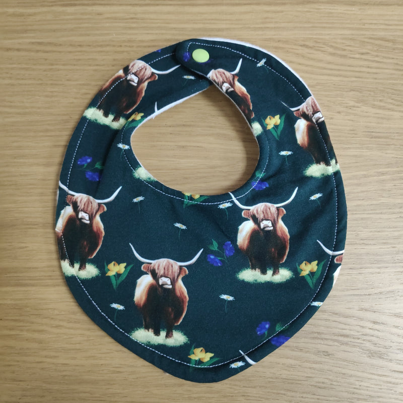 Dribble style bib - Highland cows with flowers on dark green