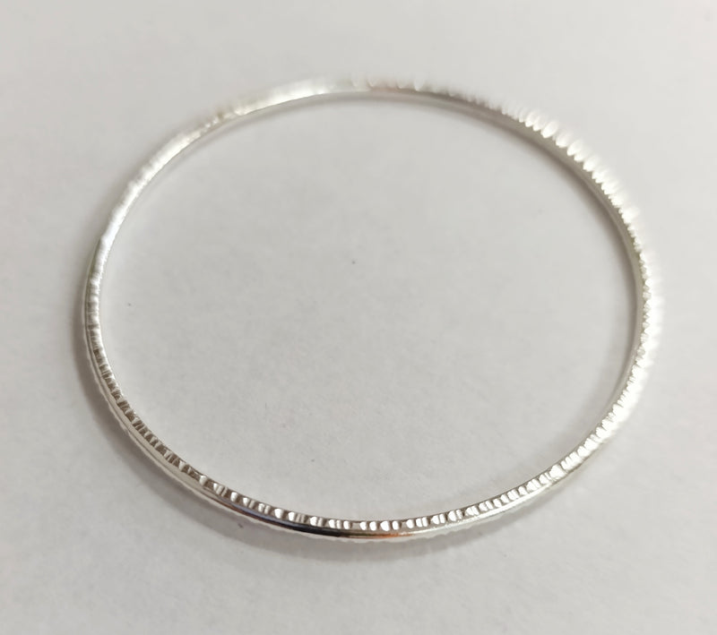 Sterling silver hammered oval bangle