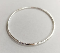 Sterling silver hammered oval bangle
