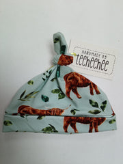 Baby knotted hat - highland cow on mint with leaves print