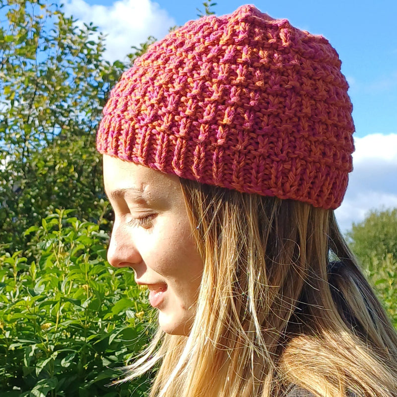 Hand knitted lightweight cotton adult hat in Brick design - pink and orange