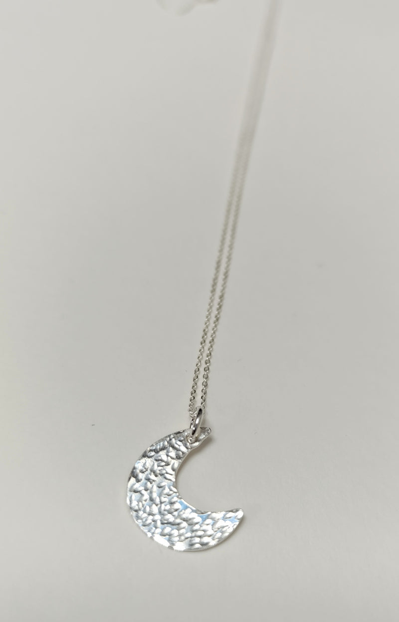 Sterling silver mini crescent moon pendant