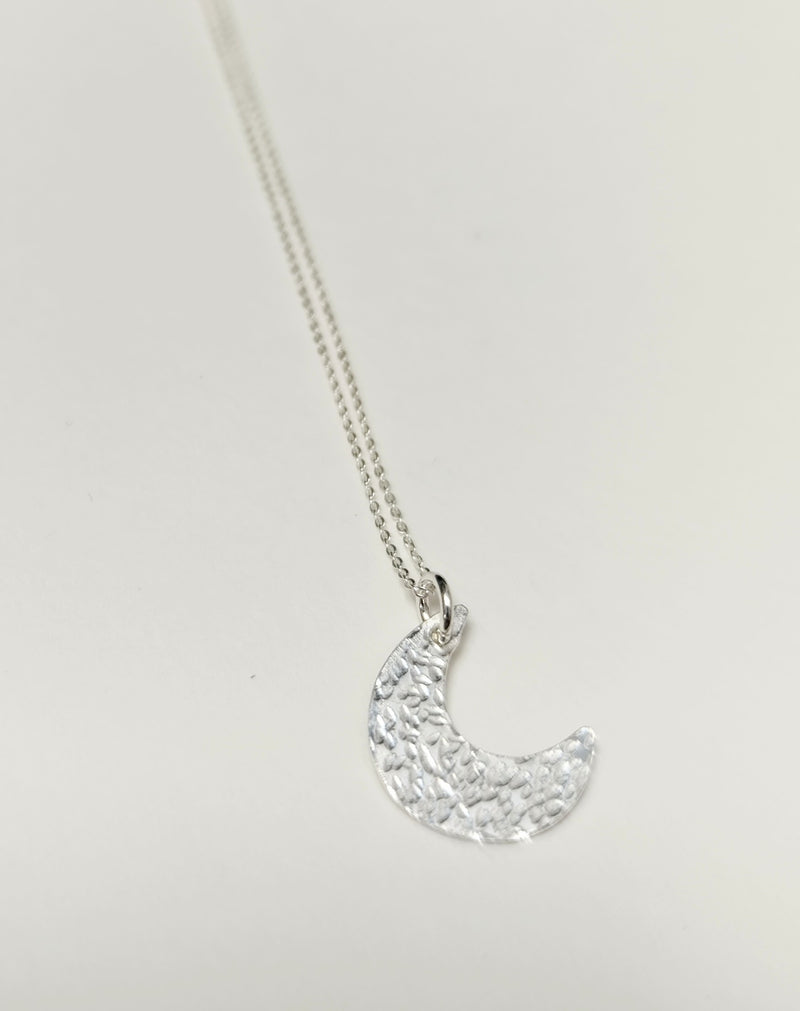 Sterling silver mini crescent moon pendant