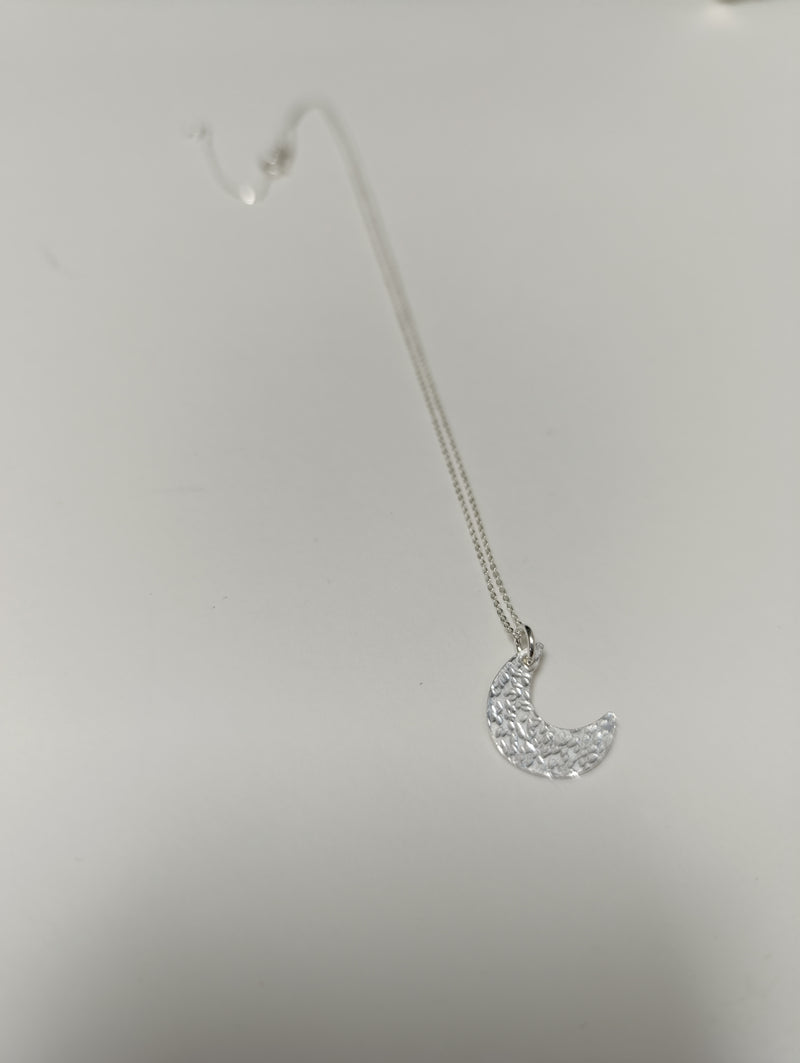 Sterling silver mini crescent moon pendant