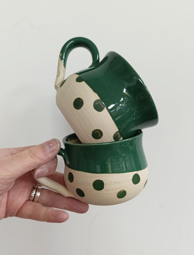 Hand thrown green spotty mug