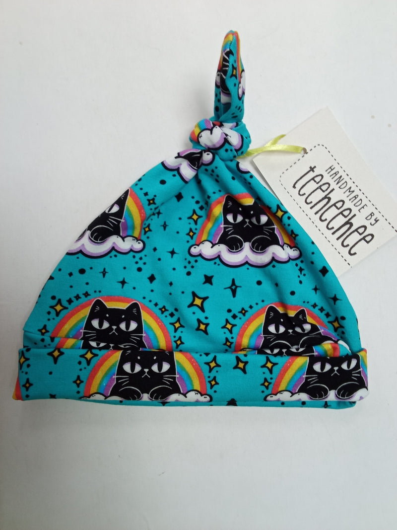 Baby knotted hat - Black cat rainbow print (6-9 months)