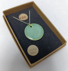 Ceramic pale green circle pendant necklace