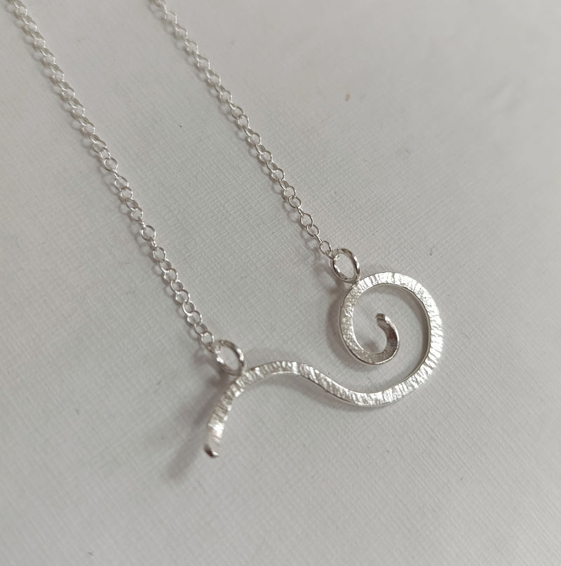 Sterling silver curved wave necklace