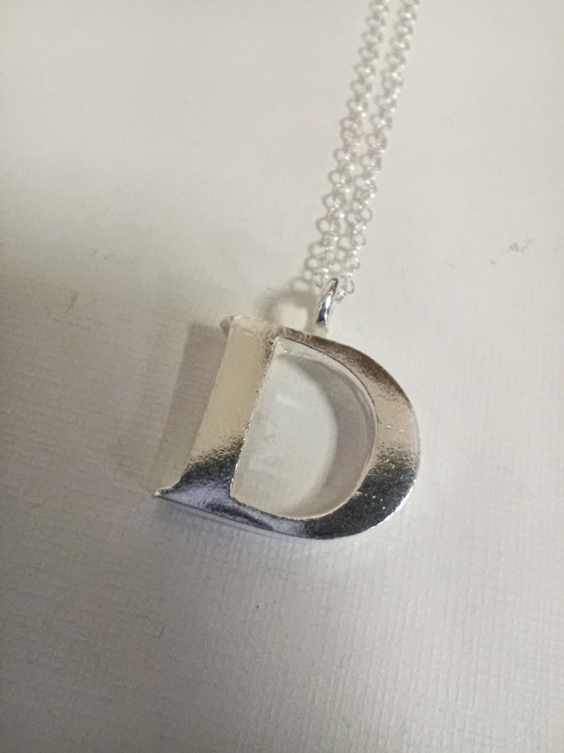 Sterling silver sand cast letter D necklace