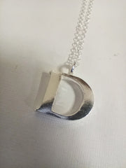 Sterling silver sand cast letter D necklace