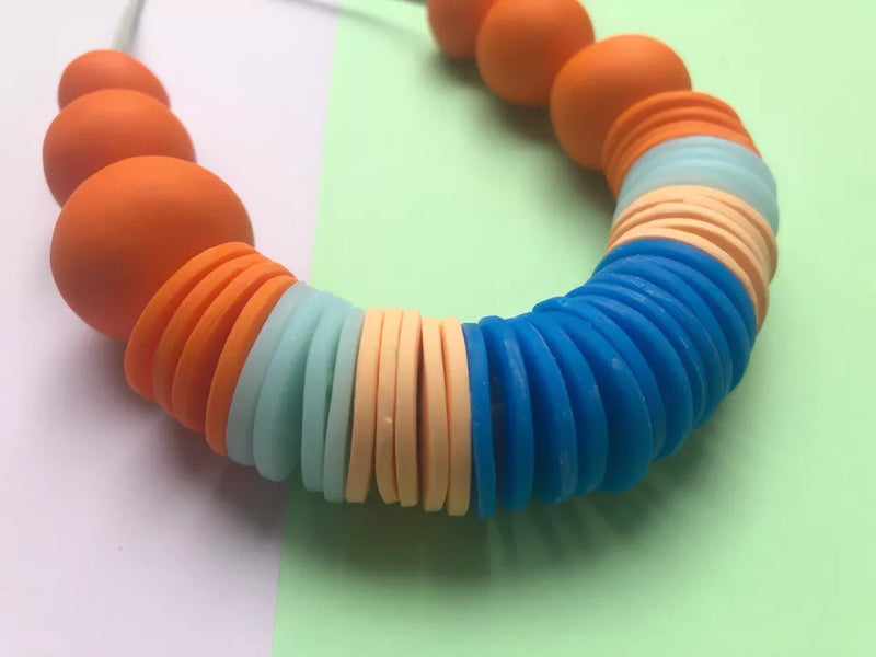 Statement bead necklace - oranges & blues