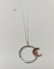 Sterling Silver hoop pendant with copper crescent