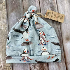 Baby knotted hat - pale blue/grey puffins