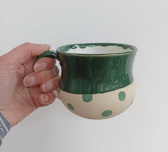 Hand thrown green spotty mug