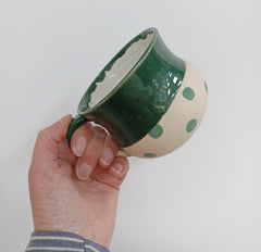 Hand thrown green spotty mug