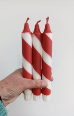 Red and white candy cane dinner candles