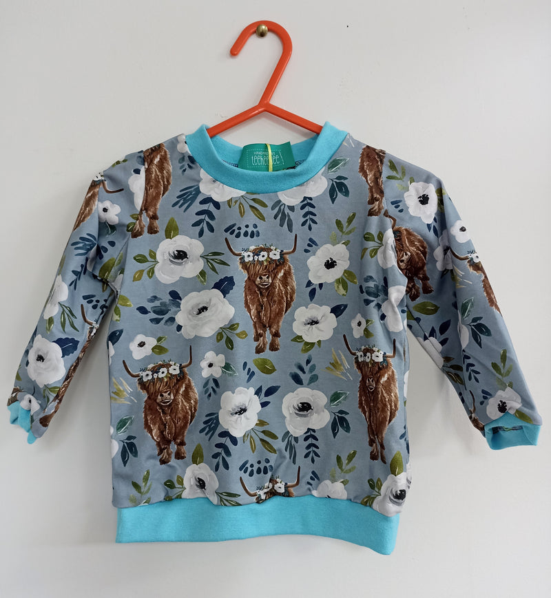 Long sleeved baby/child t-shirt - Highland Cows with white flowers (6-12 months or 2-3 years)