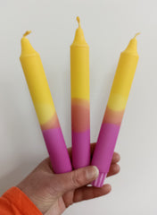 Yellow, pale orange & pink ombre dinner candles