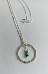 Sterling silver hoop necklace with Emerald chip beads