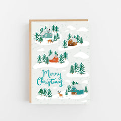 Merry Christmas reindeer and houses in the snow card