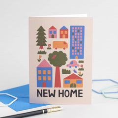 New home - buildings, trees and flowers card