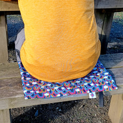 Waterproof sit mat - over the rainbow print