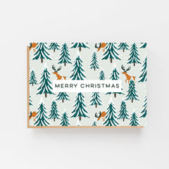 Merry Christmas reindeer and trees card