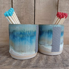 Ceramic match striker pots