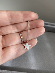 Sterling silver textured star necklace