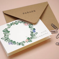 With sympathy wreath card